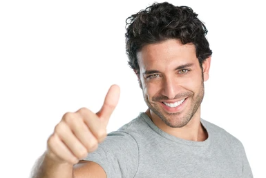 smiling man giving thumbs up sign